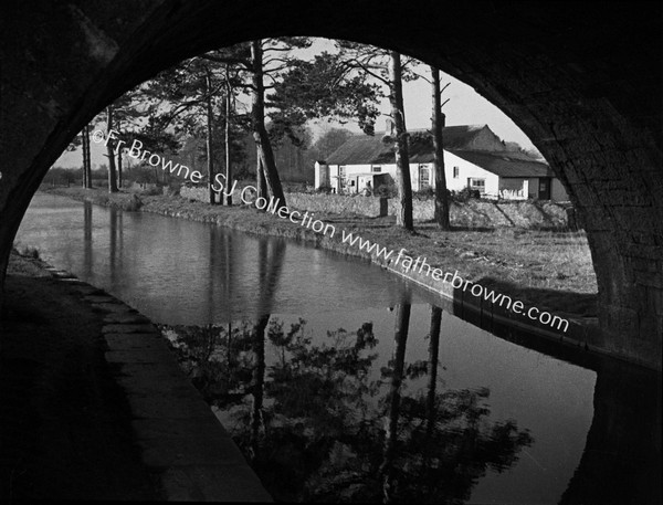 COTTAGE THROUGH CANAL BRIDGE